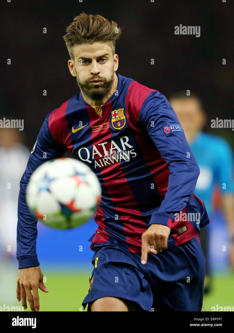 Berlin, Germany. 06th June, 2015. Barcelona's Gerard Pique plays the ball  during the UEFA Champions League final soccer match between Juventus FC and  FC Barcelona at Olympiastadion in Berlin, Germany, 06 June