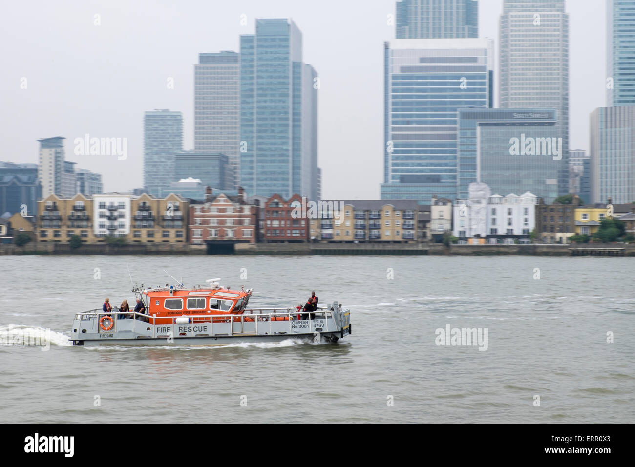 Fire rescue boat on the River Thames opposite Canary Wharf Stock Photo