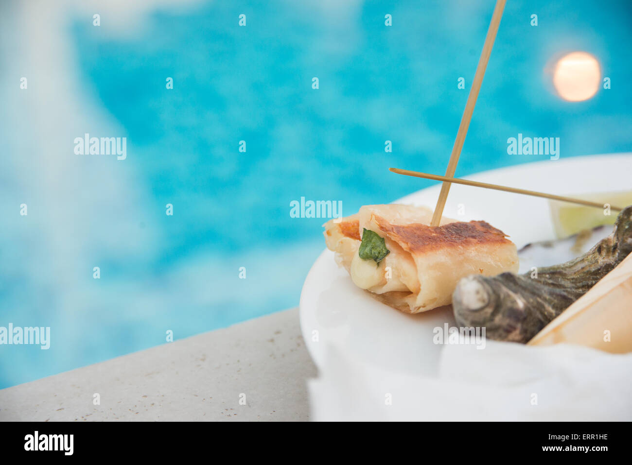 A really beautiful happy hour on the pool side. Stock Photo