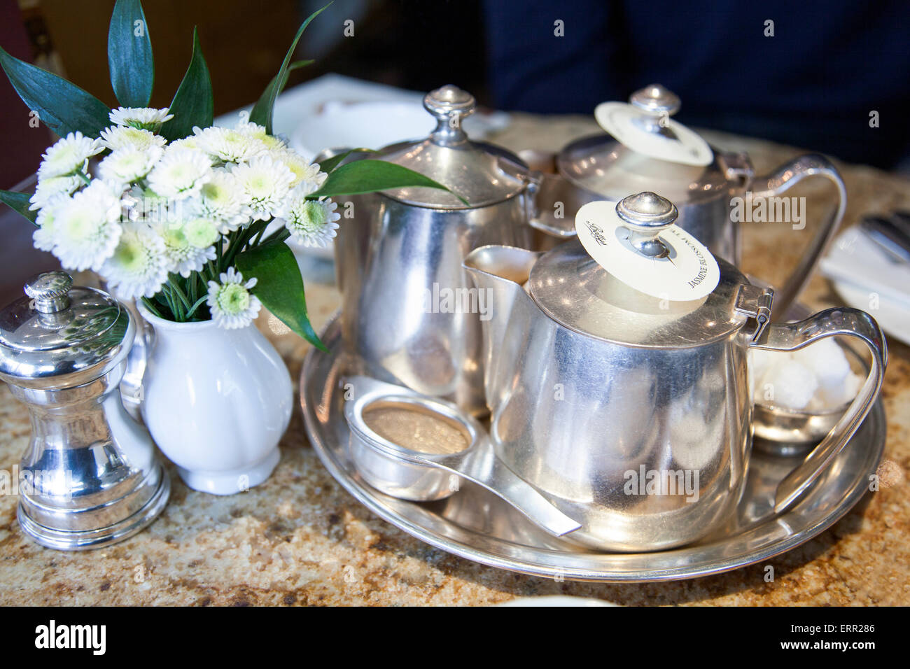 Tea silverware on a table (at Betty's Tea Room in York, England) Stock Photo