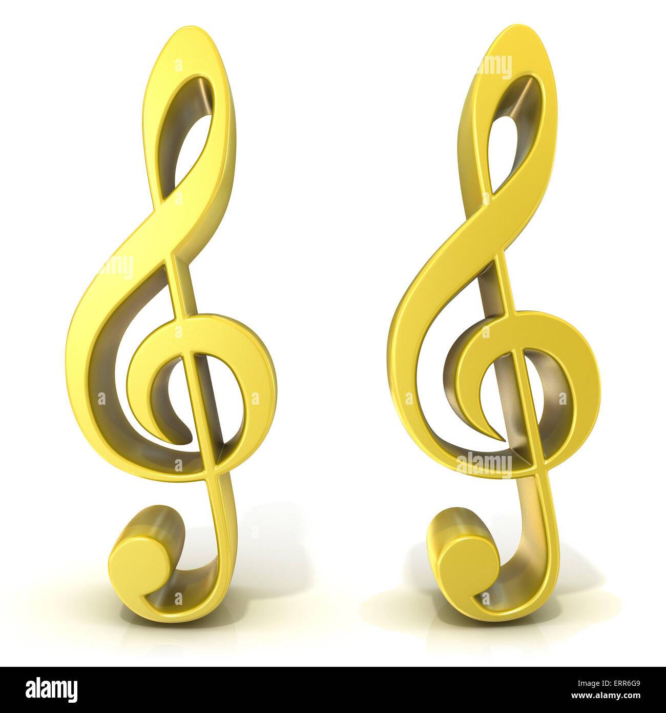 Golden treble clefs isolated on white background Stock Photo