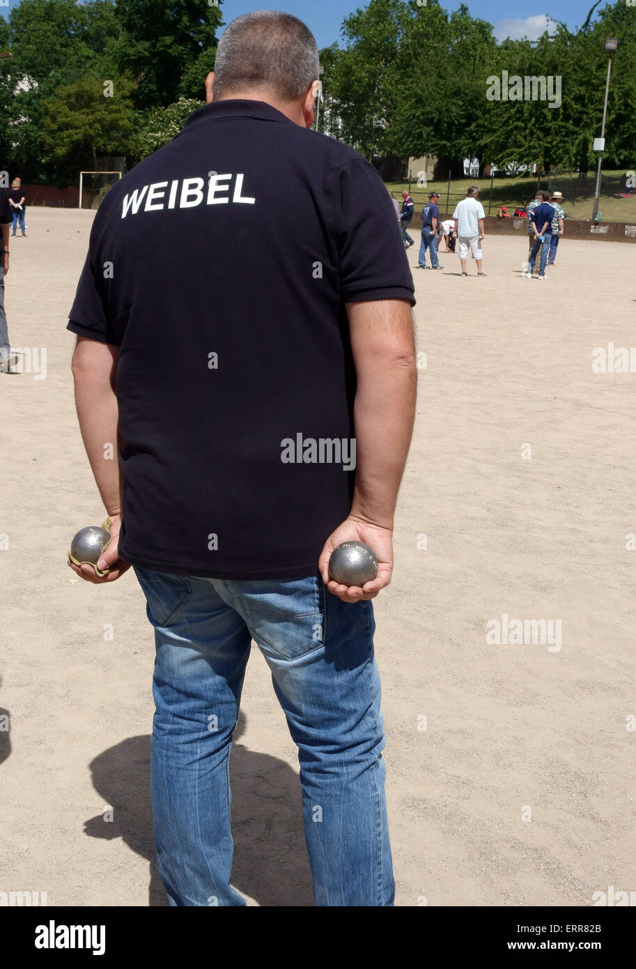 London, UK. 7th June, 2015. The Londonaise 2015 Petanque Tournament reached its final stage in Islington, London today. Teams from far and wide gathered in Barnard Park to compete for the 2,500 Euros prize. Among the players was Charles 'Claudy' Weibel from Belgium who has been World Champion in boules. Credit:  Jeffrey Blackler/Alamy Live News Stock Photo
