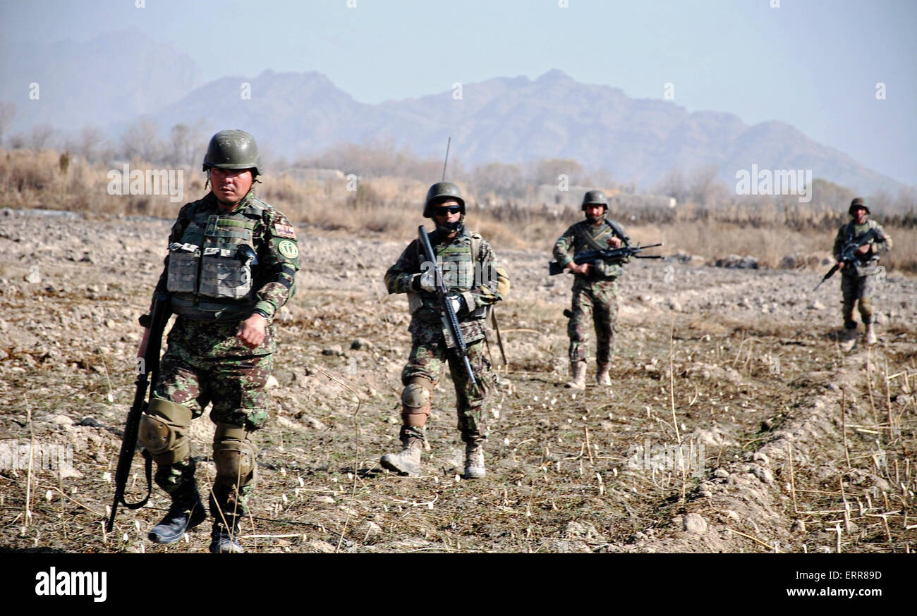Afghan National Army soldiers during a patrol April 28, 2015 in Kandahar province, Afghanistan. Stock Photo