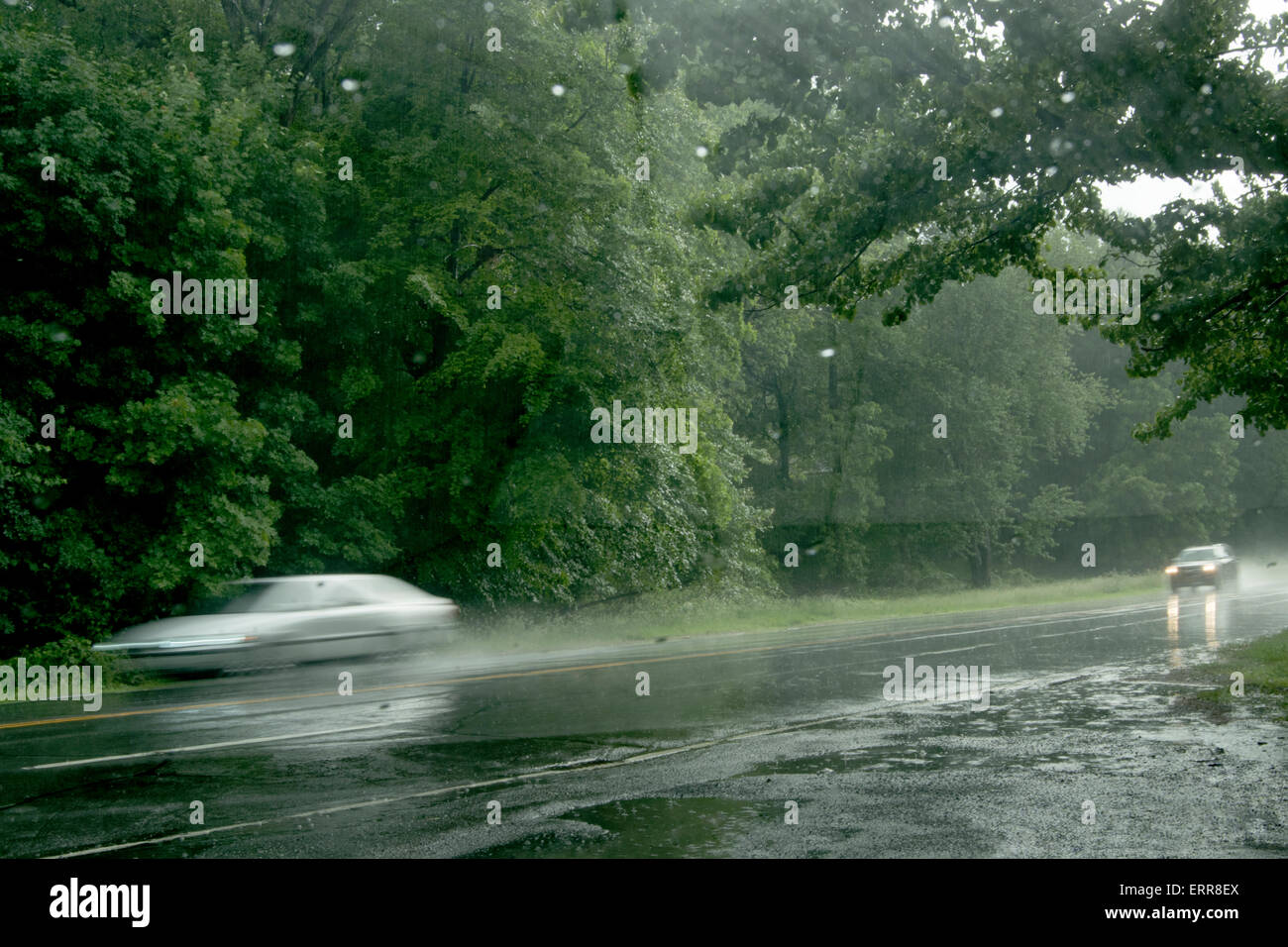 Cars traveling on rainy road, Hastings, New York Stock Photo Alamy