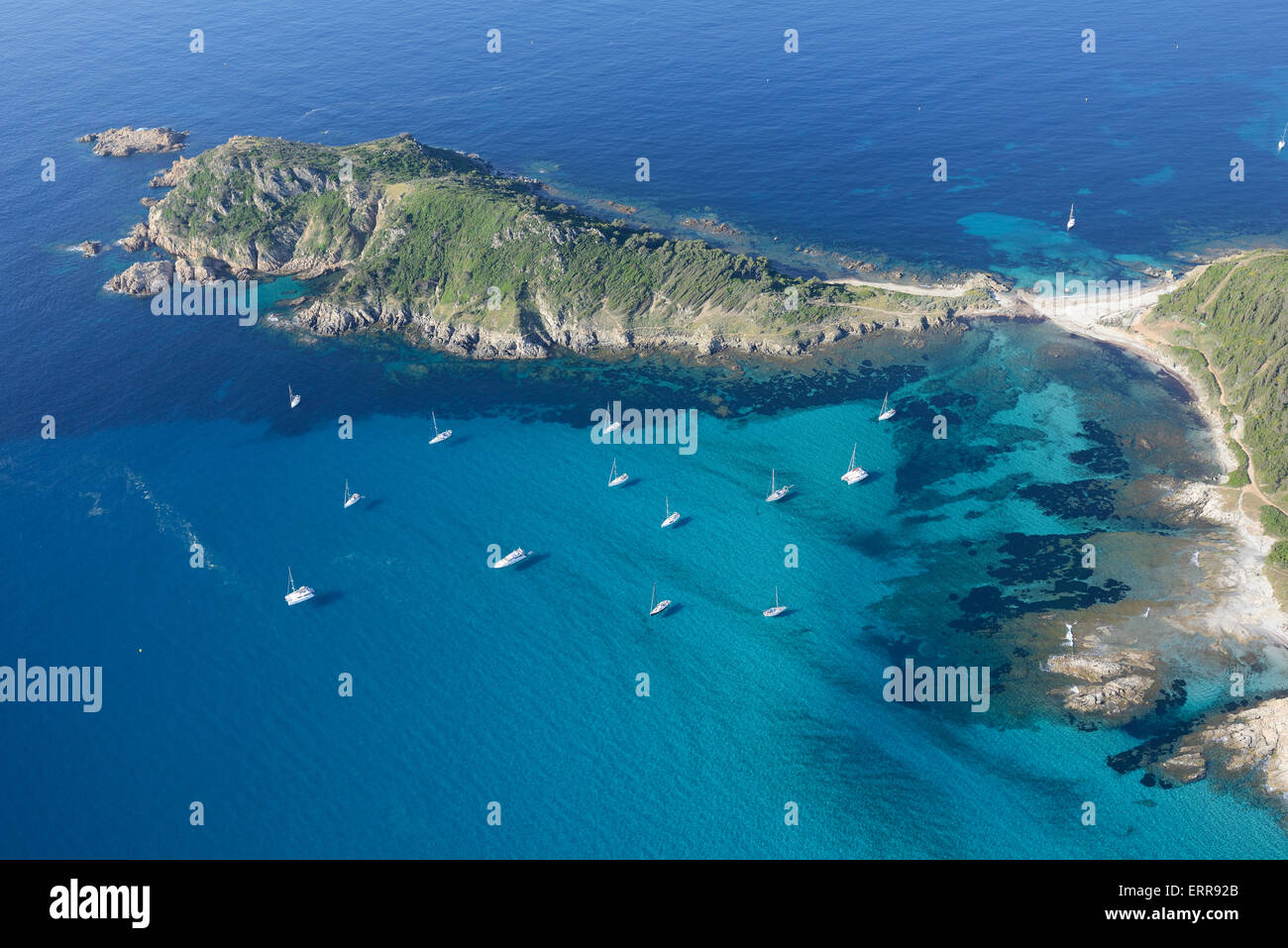 AERIAL VIEW. Rocky promontory on the Mediterranean shores. Cap Taillat, split between the city of La Croix Valmer and Ramatuelle, Var, france. Stock Photo