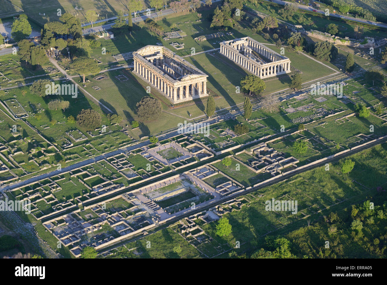 AERIAL VIEW. Greek temples of Hera II or Neptune(left) and Hera (right). Paestum, Province of Salerno, Campania, Italy. Stock Photo