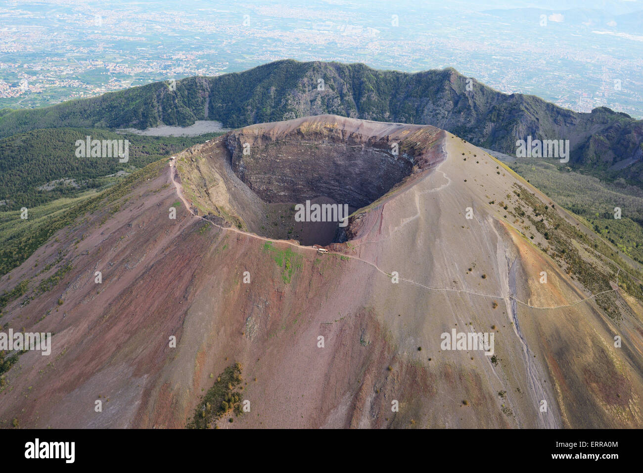 AERIAL VIEW. Crater of Mount Vesuvius (elevation: 1281m), Mount Somma (elevation: 1132m) standing behind. Between Naples and Pompeii, Campania, Italy. Stock Photo