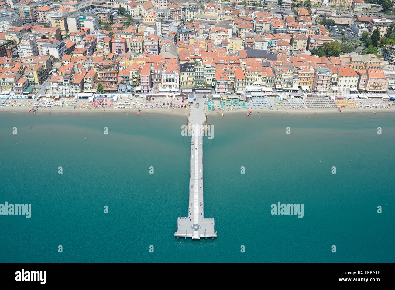 AERIAL VIEW. Seaside resort of Alassio with its sandy beaches and its pier. Province of Savona, Liguria, Italy. Stock Photo