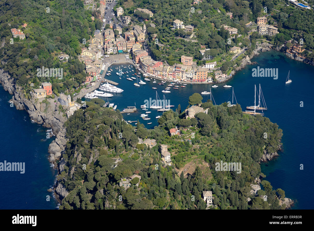 AERIAL VIEW. Portofino's natural harbor. Metropolitan city of Genoa, Liguria, Italy. Stock Photo