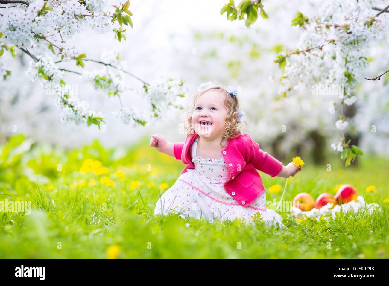 Adorable Happy Toddler Girl With Curly Hair And Flower Crown
