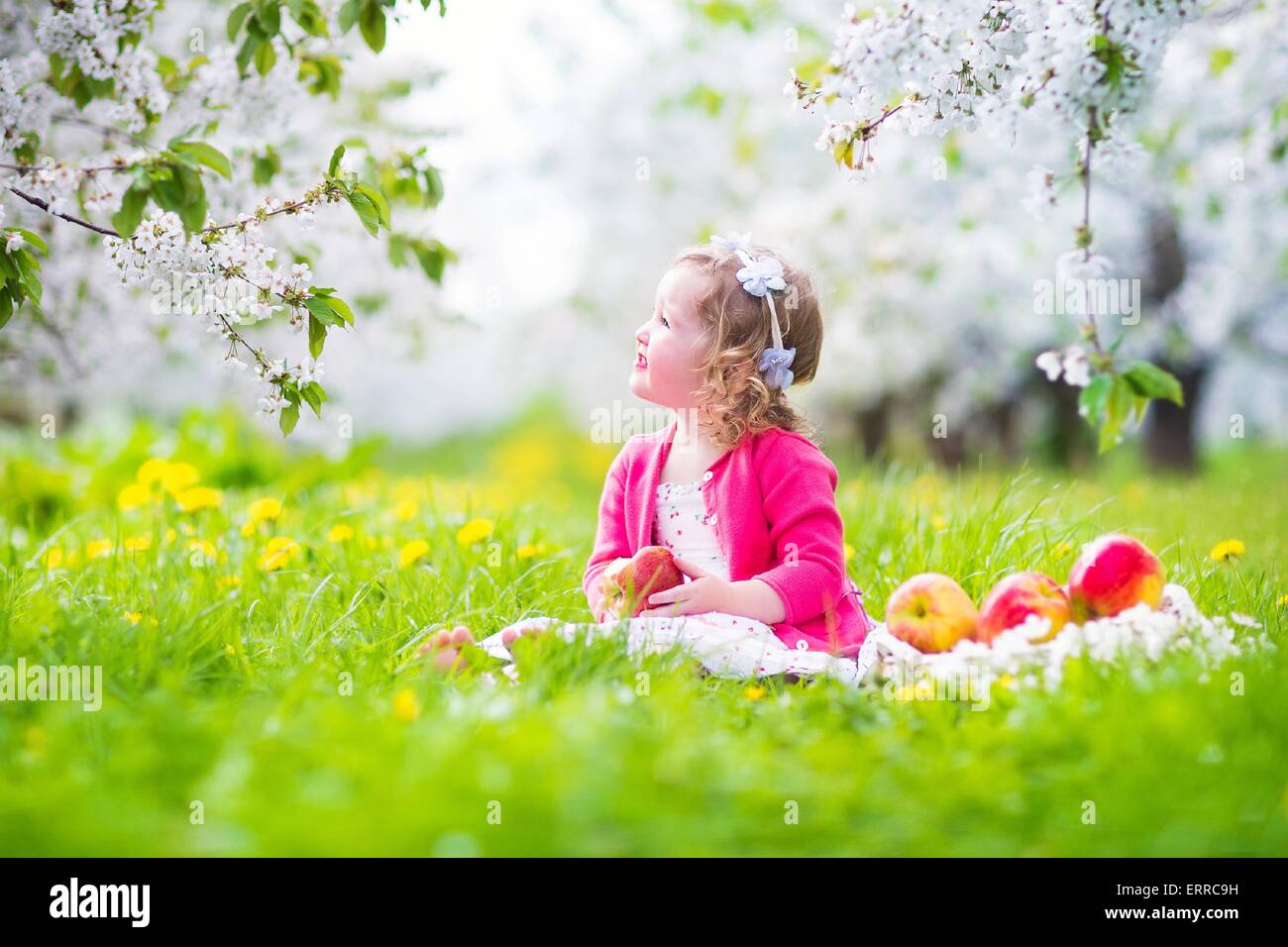 Adorable Happy Toddler Girl With Curly Hair And Flower Crown