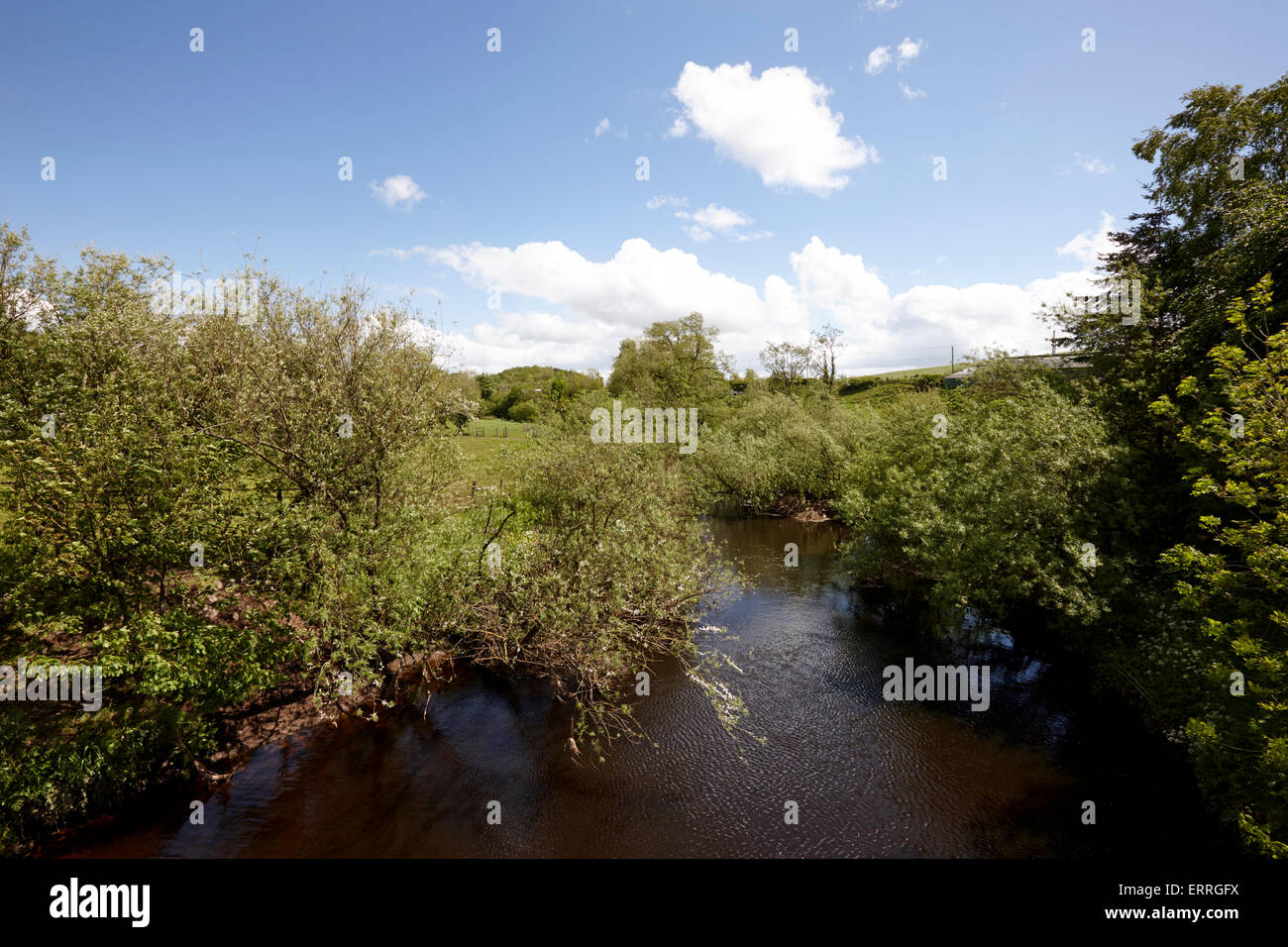 the river blackwater marking the border between county tyrone in northern ireland on the left and county monaghan in the republi Stock Photo