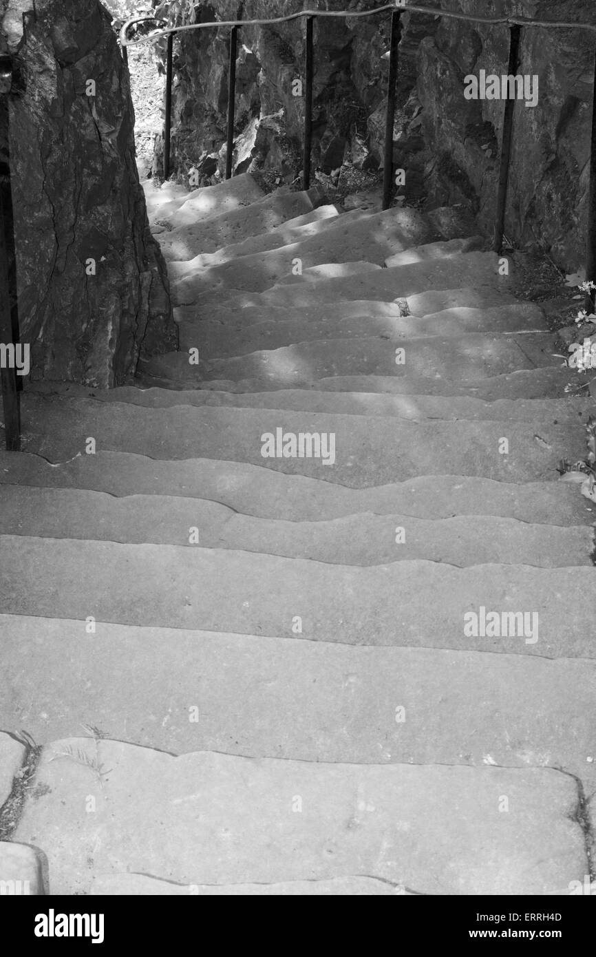 Weathered outdoor stone steps facing downwards Stock Photo