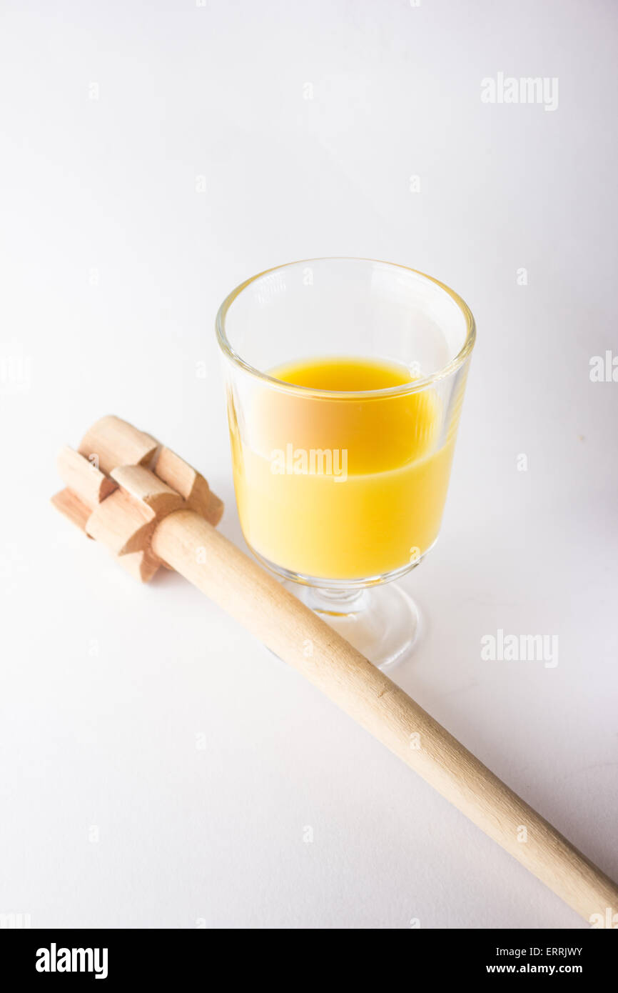 Glass of poncha in white background Stock Photo - Alamy