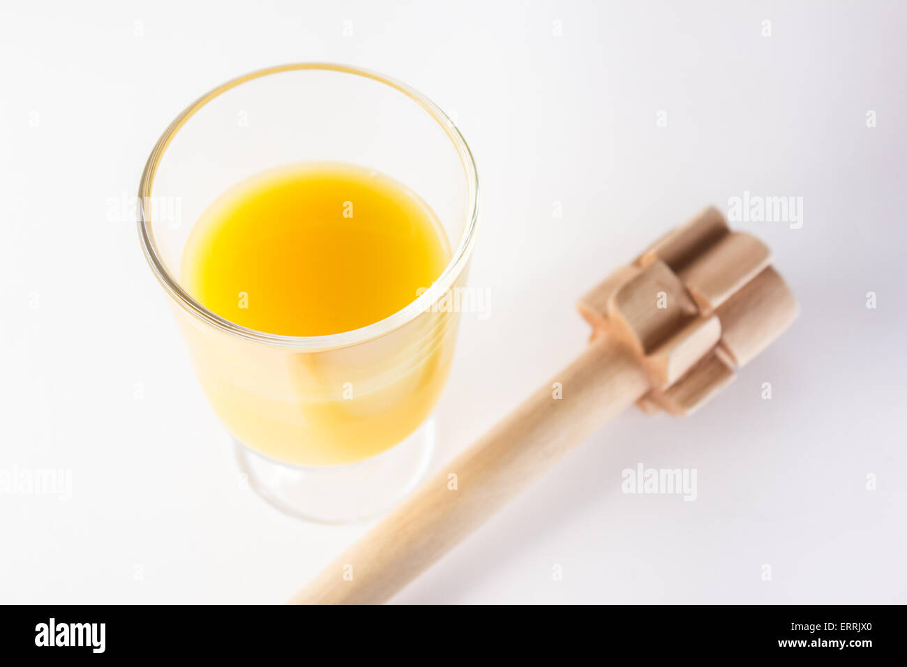 Glass of poncha in white background Stock Photo - Alamy