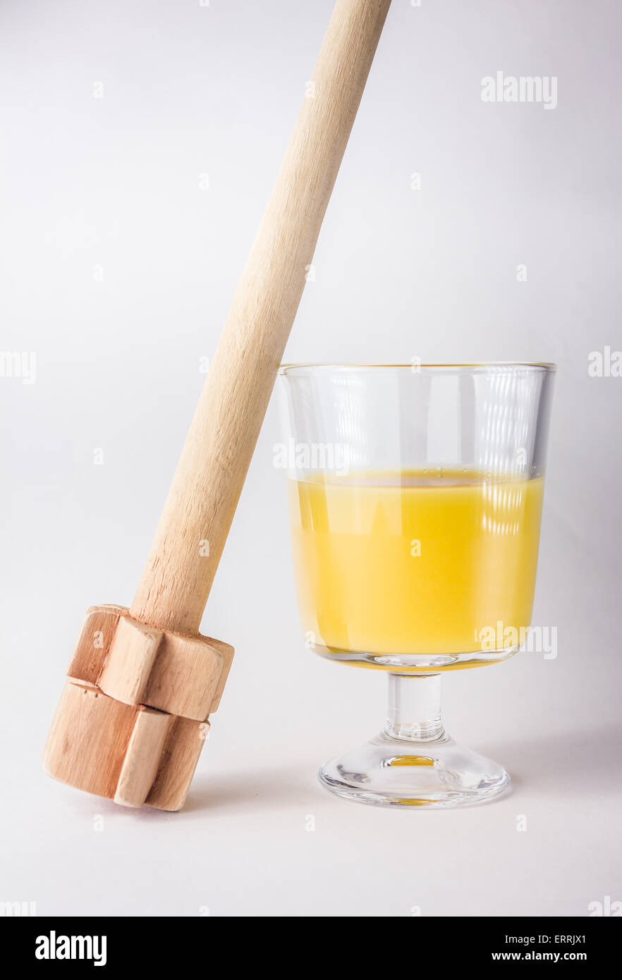Glass of poncha in white background Stock Photo - Alamy