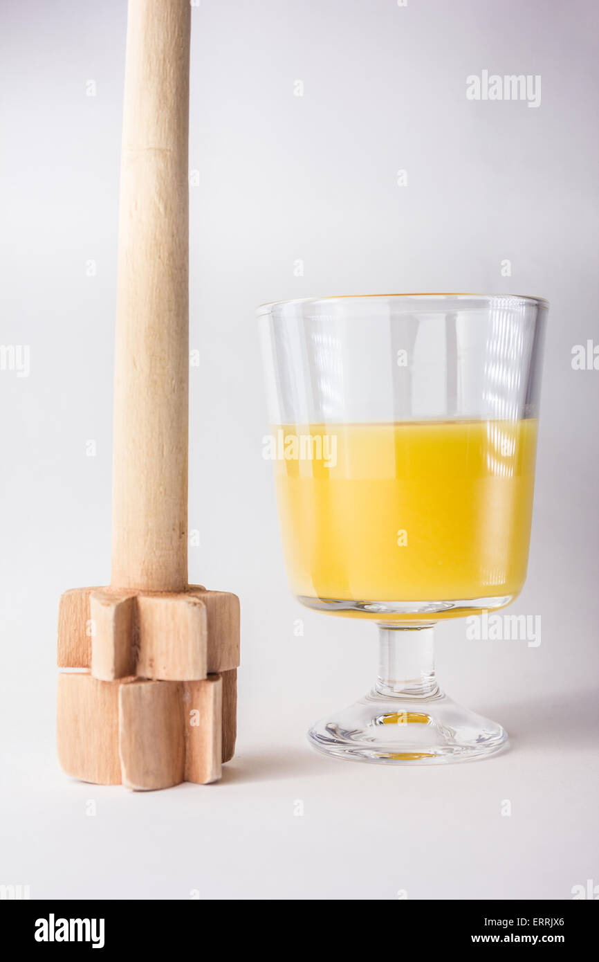 Glass of poncha in white background Stock Photo - Alamy
