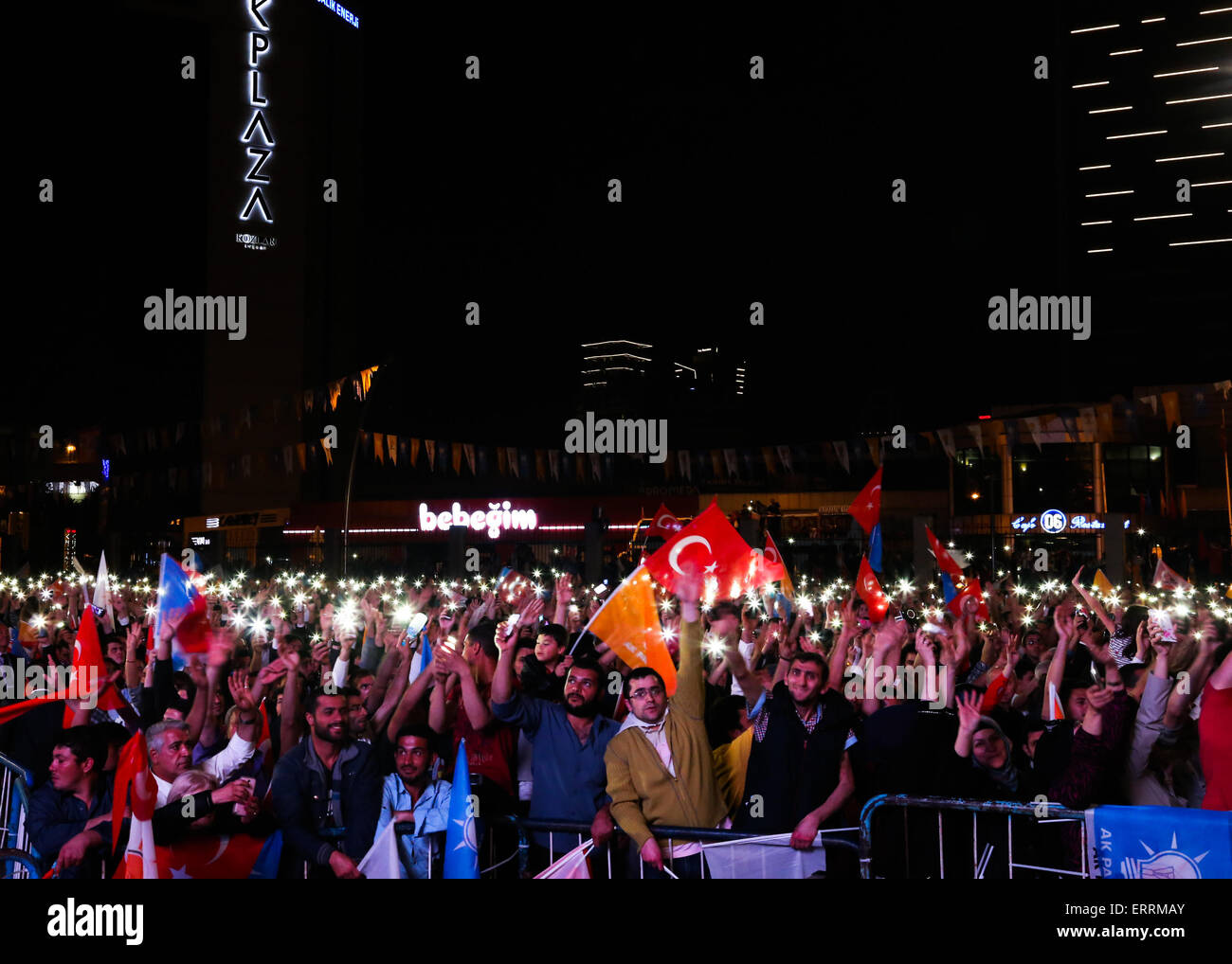 Ankara, Turkey. 7th June, 2015. The ruling Justice and Development Party (AKP) supporters celebrate over the election results in Ankara, capital of Turkey, June 7, 2015. The loss of majority in the parliament by the ruling Justice and Development Party (AKP) has paved the way for either a coalition government or an interim minority government that is slated to take the nation to an early election, analysts said on Sunday. © Zou Le/Xinhua/Alamy Live News Stock Photo