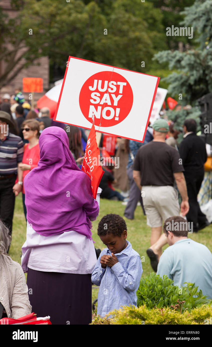 Thousands of people joined Sit-in and March in Queen's Park to protest the Liberal government's controversial sex-education curriculum.   June 7 , 2015 in  Toronto, Canada. Stock Photo