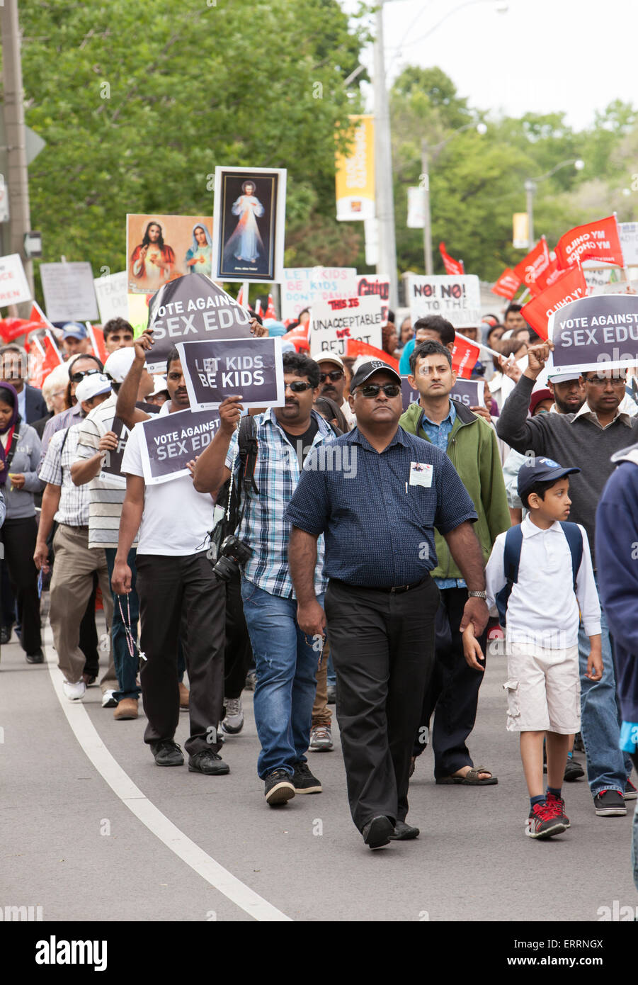 Toronto, Canada. 7th June, 2015. Thousands of people joined Sit-in and March in Queen’s Park to protest the Liberal government’s controversial sex-education curriculum.   June 7 , 2015 in  Toronto, Canada. Stock Photo