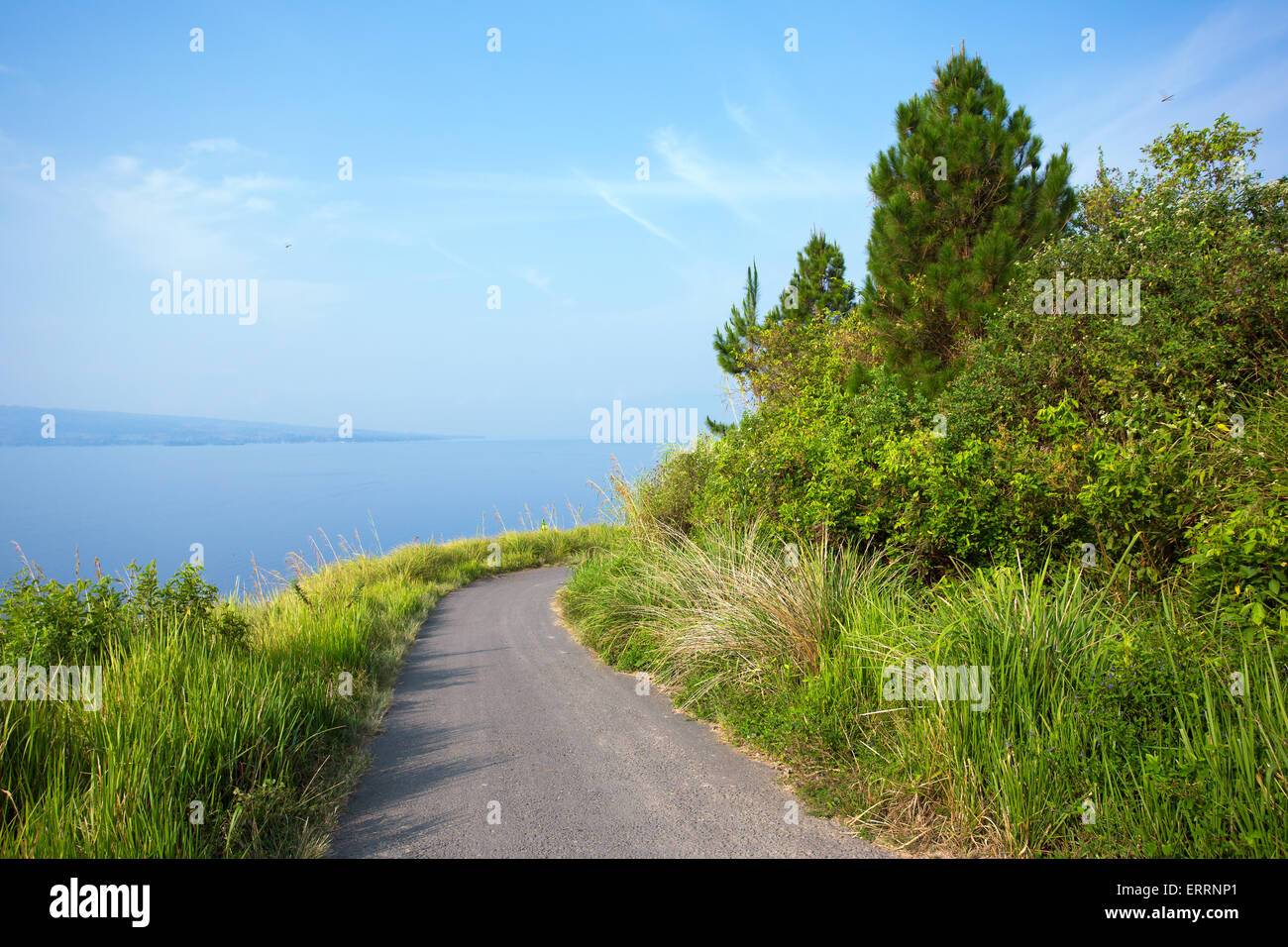 View of a mountain road and Lake Toba, Indonesia, Southeast Asia Stock Photo