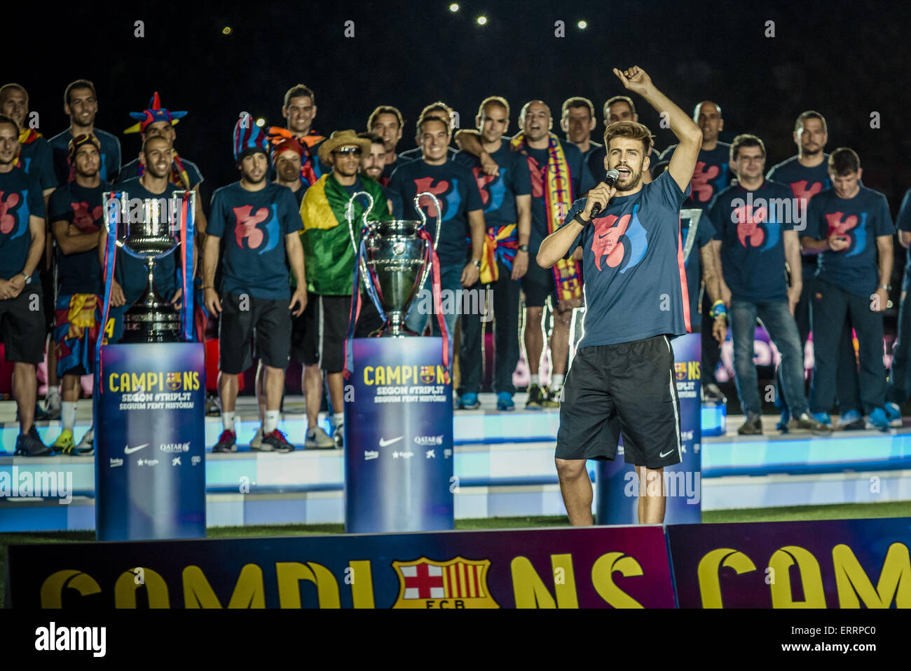 Barcelona, Catalonia, Spain. 7th June, 2015. FC Barcelona's centre-back GERARD PIQUE delivers a short speech in front of his team mates during a victory ceremony to celebrate the 2nd 'Triple' in the club's history in the Camp Nou stadium Credit:  Matthias Oesterle/ZUMA Wire/ZUMAPRESS.com/Alamy Live News Stock Photo