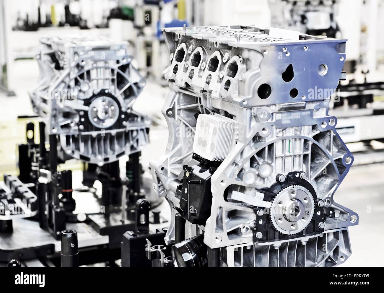Production line for manufacturing of the engines in the car factory. Stock Photo