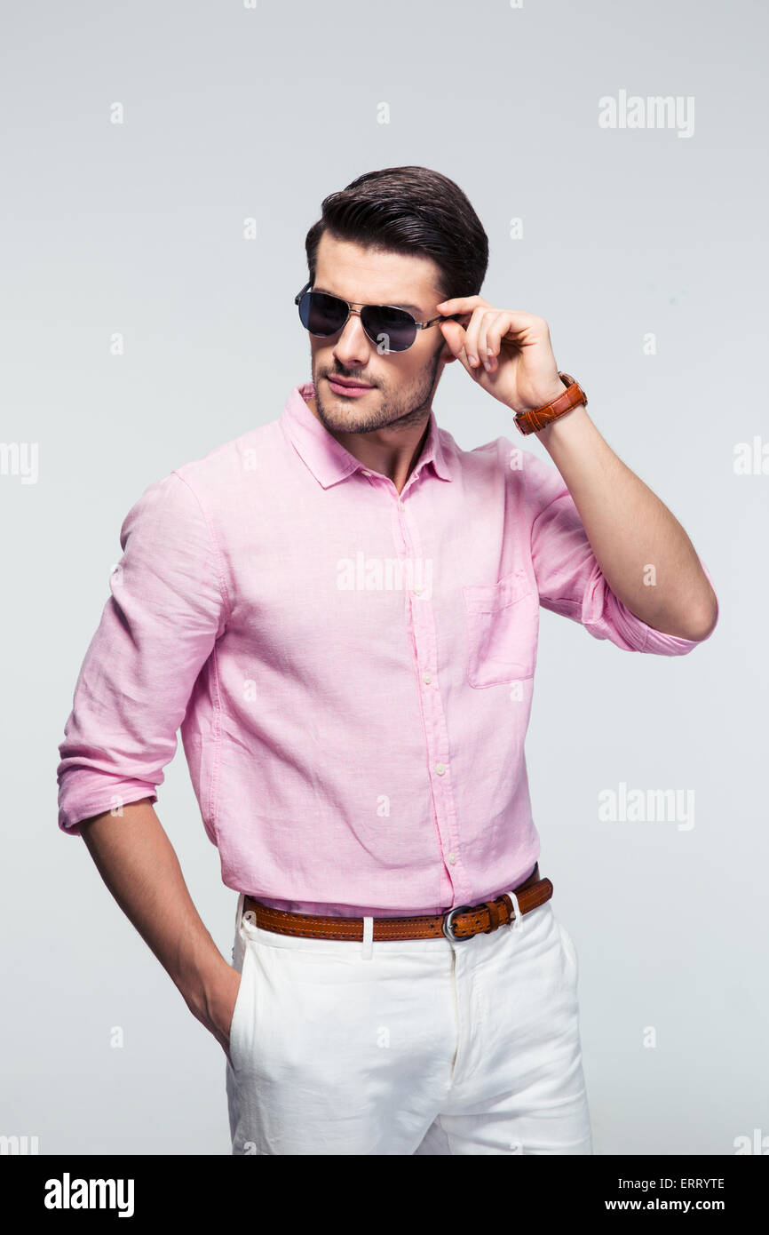 Confident man in pink shirt hi-res stock photography and images - Alamy