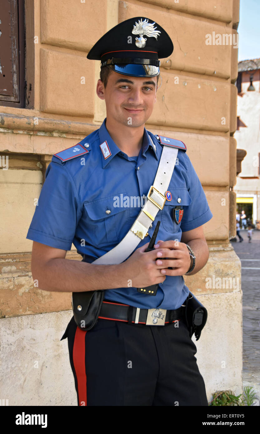 A young policeman patrolling near the Jewish quarter in Rome, Italy. Stock Photo