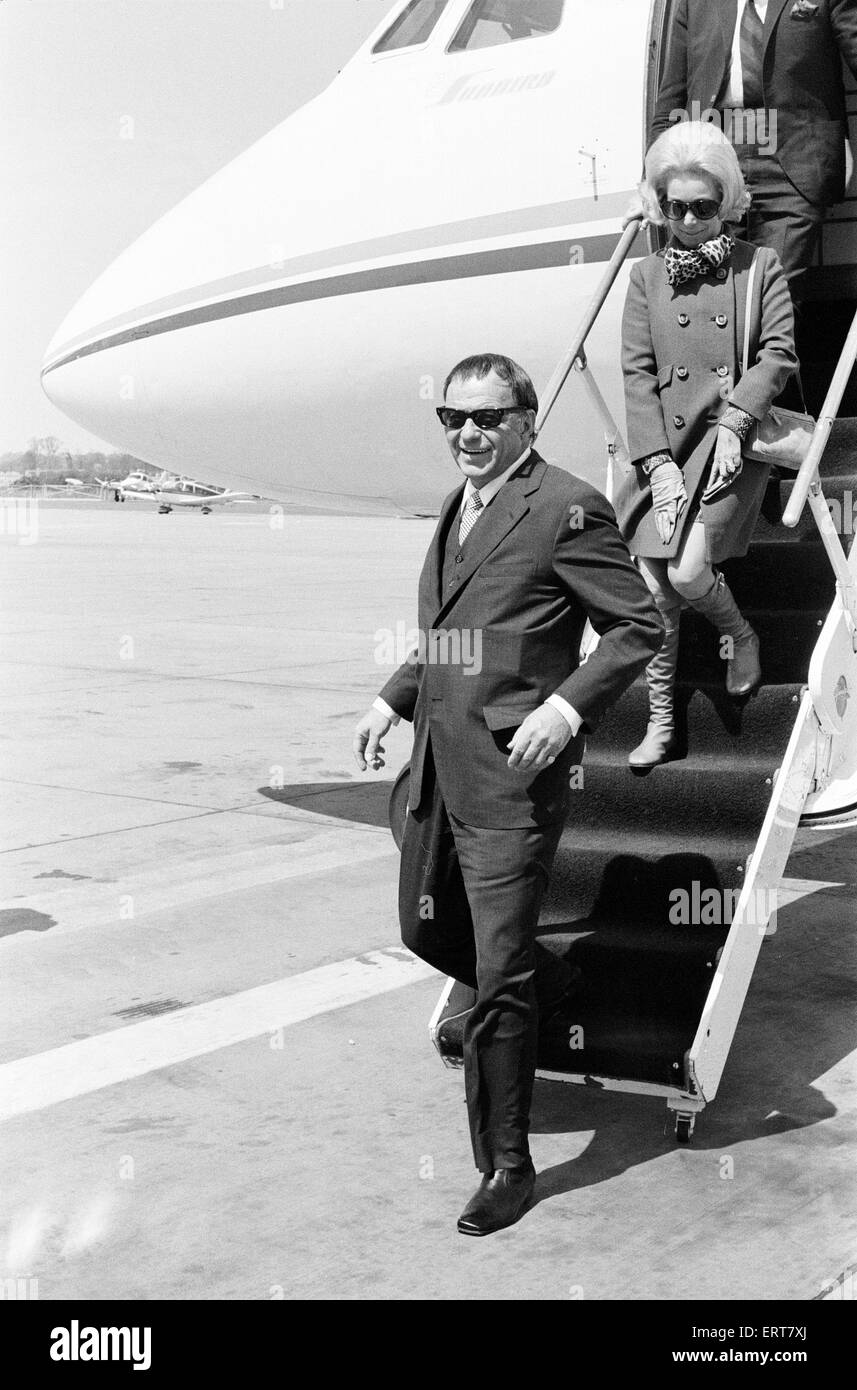 Frank Sinatra, flies into London Gatwick Airport, on his personal Gulf stream jet, Monday 4th May 1970. Also pictured, daughter, Nancy Sinatra. Stock Photo
