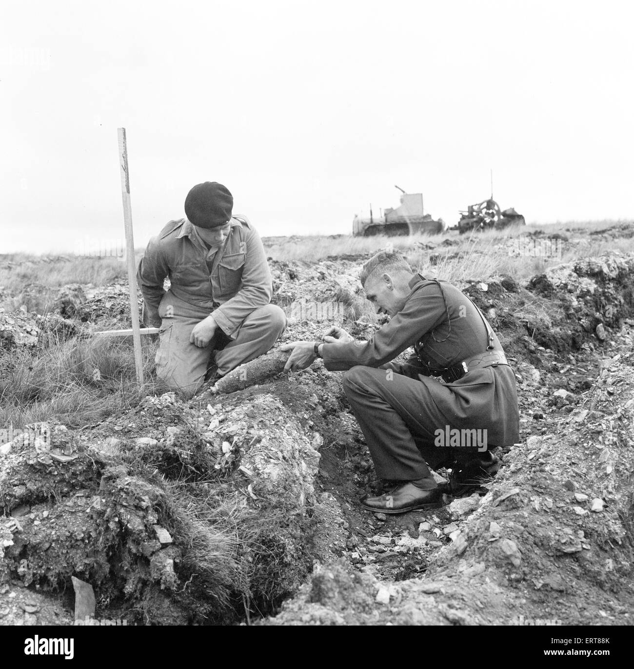 Armoured Tractor, ploughing fields littered with shells and bombs, 31st August 1969. Forestry Commission volunteers help reclaim 900 acres of a Royal Artillery range for forestry work, Trawsfynydd, Merioneth, North Wales. Stock Photo