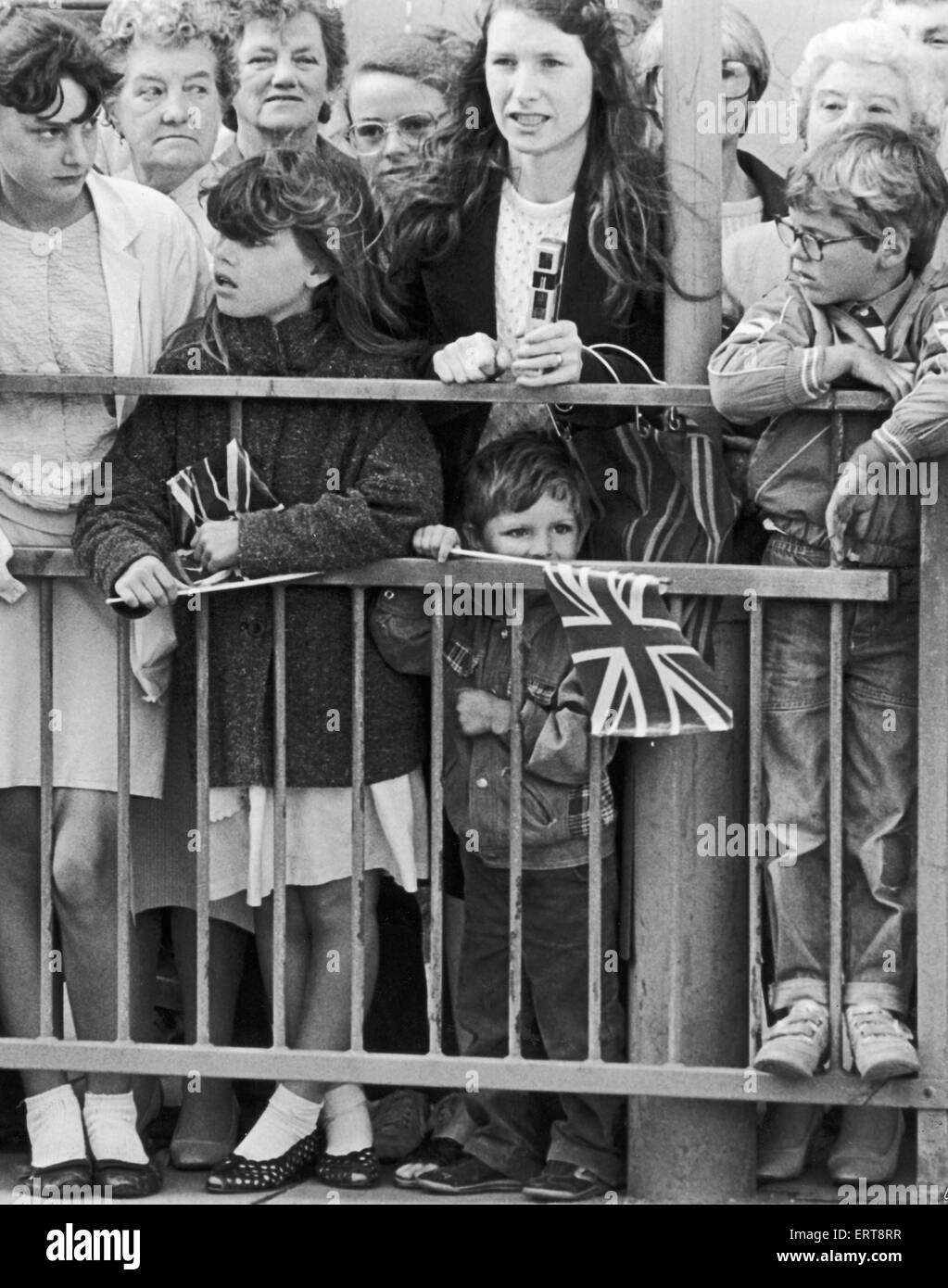 Well wishers wait to greet the Prince and Princess of Wales in Middlesbrough. 17th July 1985 Stock Photo