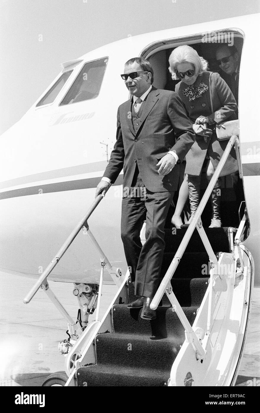 Frank Sinatra, flies into London Gatwick Airport, on his personal Gulf stream jet, Monday 4th May 1970. Also pictured, daughter, Nancy Sinatra. Stock Photo