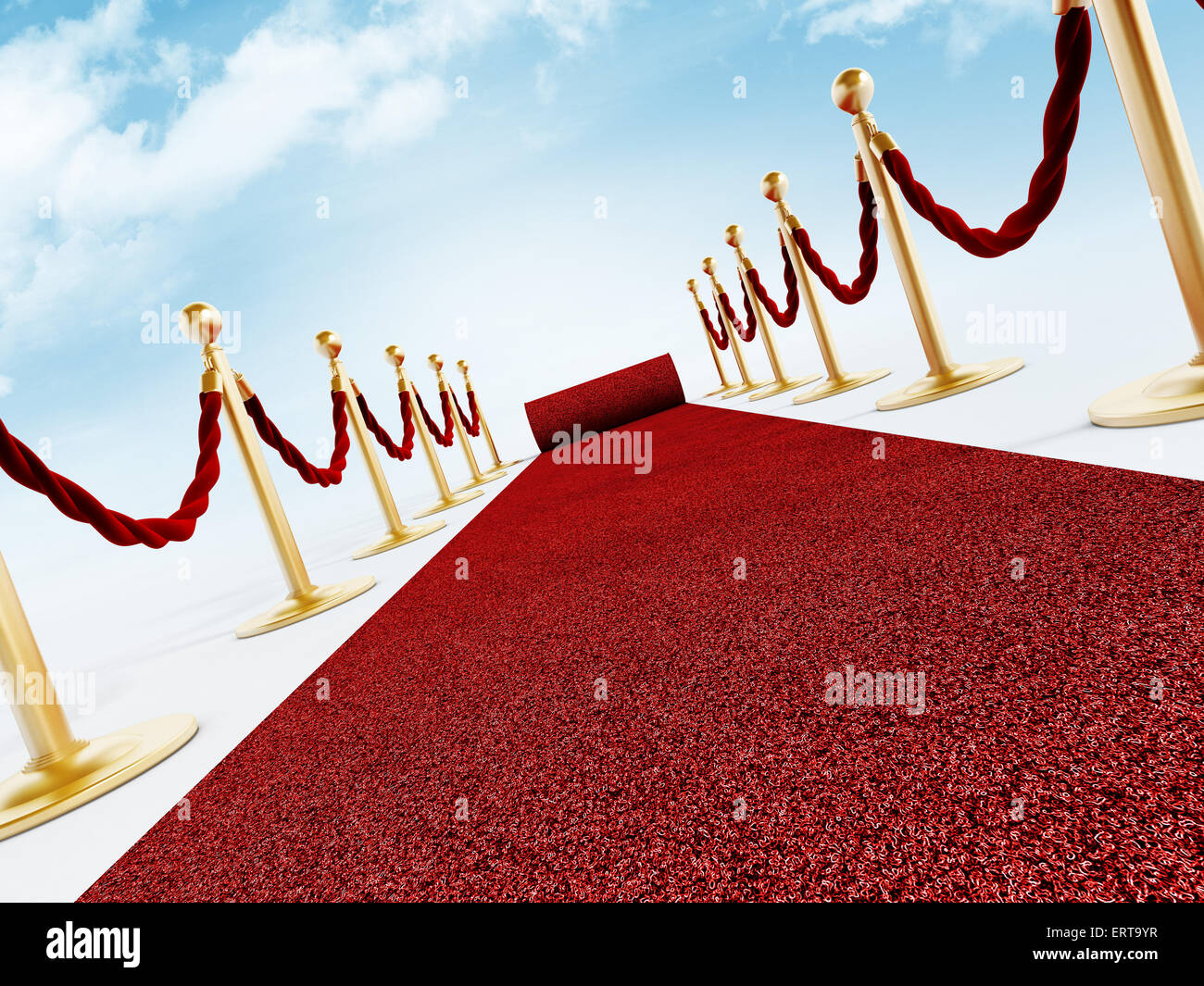 Rolled red carpet and velvet ropes against the blue sky Stock Photo Alamy