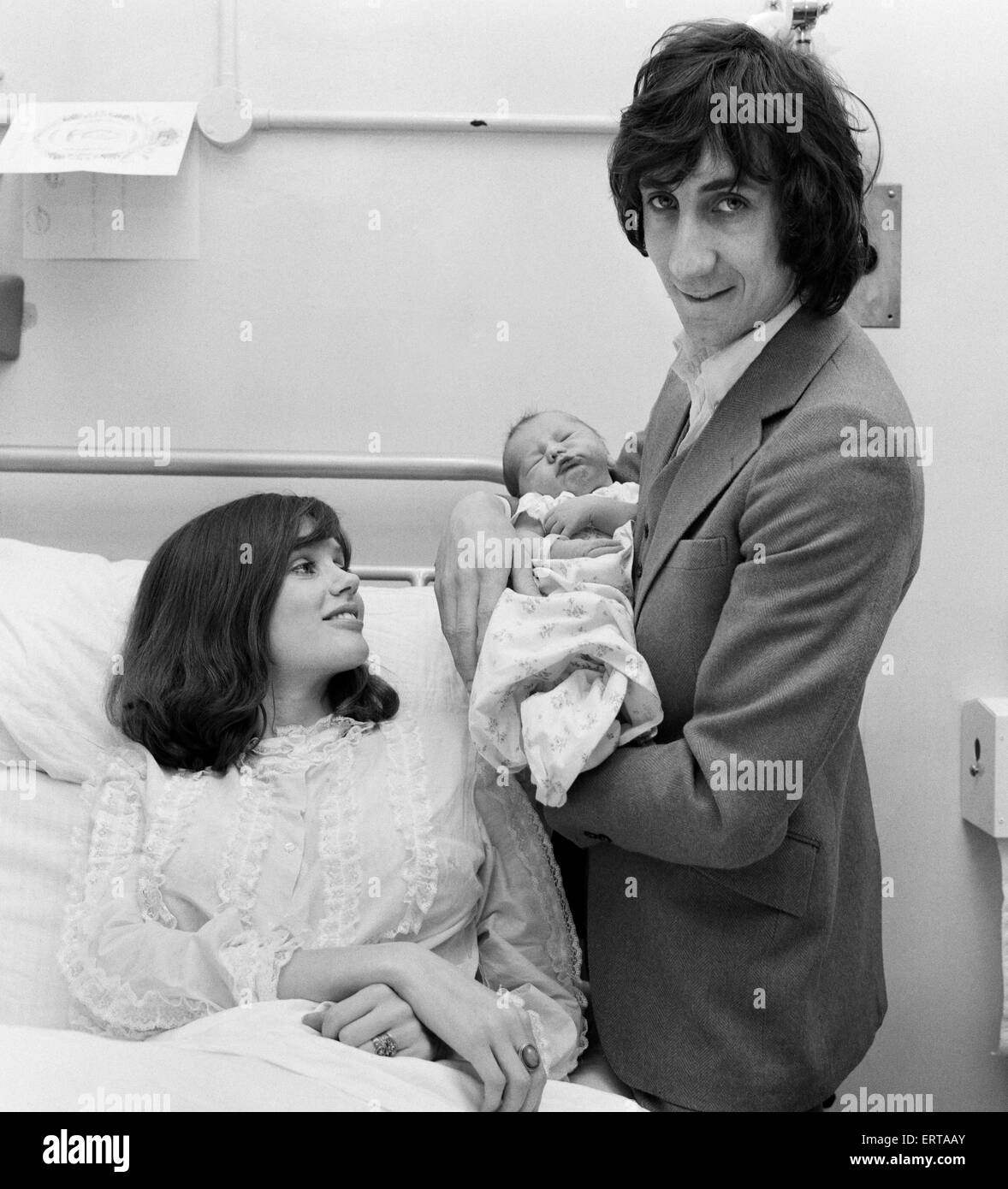 Pete Townshend of British rock group The Who with his wife Karen and their new born baby daughter at Queen Charlotte's hospital, London.  30th March 1969. Stock Photo