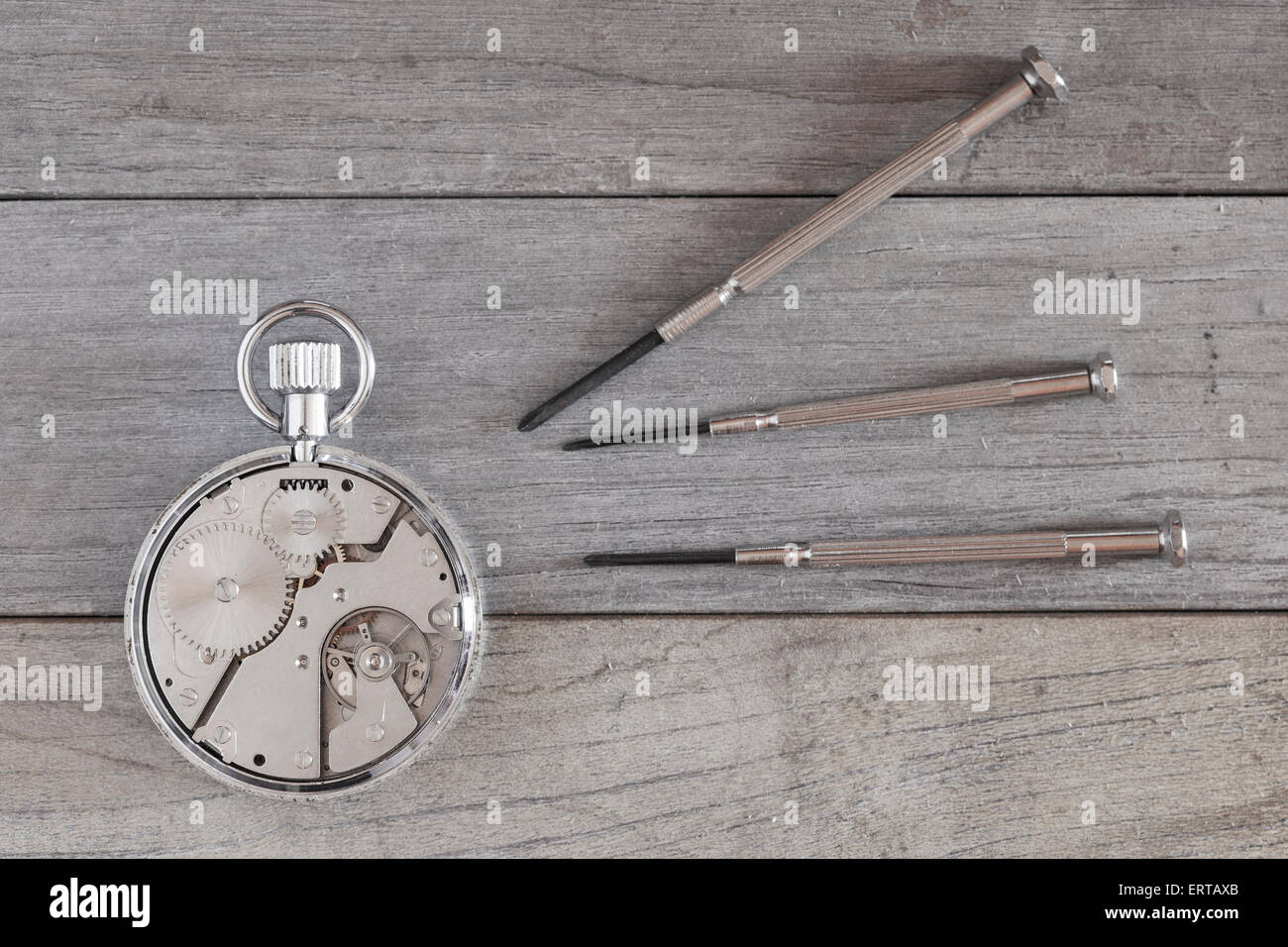 repairing an old and broken clock Stock Photo Alamy
