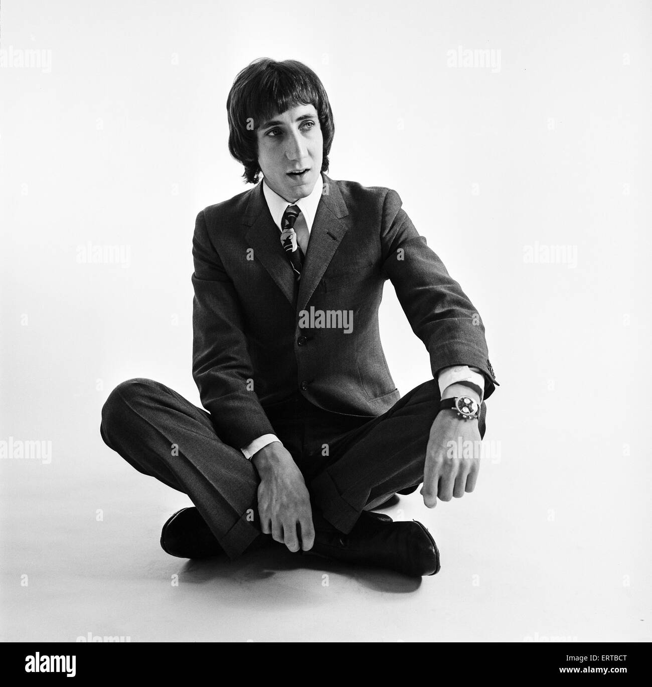 Pete Townshend of British rock group The Who, poses in the studio wearing suit and tie. 14th December 1967. Stock Photo