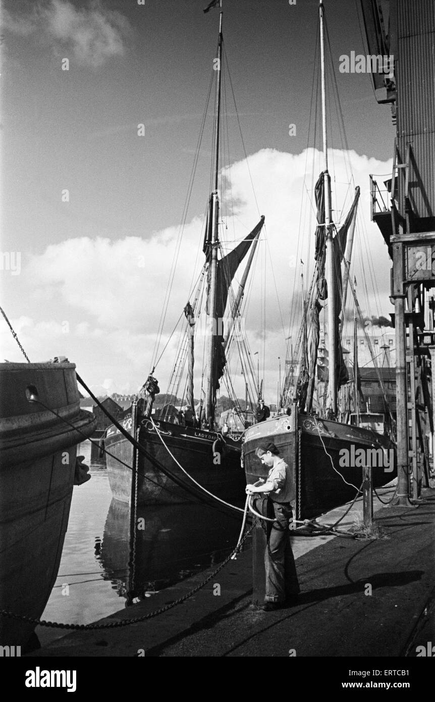 Young boy at the quayside at Ipswich Docks, on the estuary of the River Orwell, Suffolk. 11th June 1946 Stock Photo