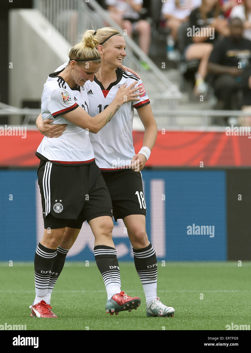 Ottawa, Canada. 07th June, 2015. Germany's Alexandra Popp (R) celebrate with Anja Mittag her goal to the 3-0 during the FIFA Women's World Cup 2015 Group B soccer match between Germany and Cote d'lvoire at the Lansdowne Stadium in Ottawa, Canada, 07 June 2015. Photo: Carmen Jaspersen/dpa/Alamy Live News Stock Photo