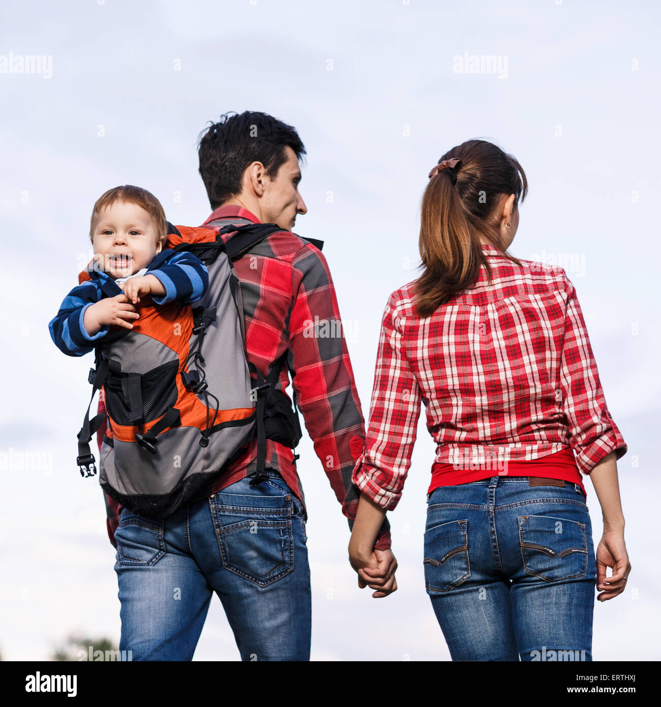 Baby boy in backpack Stock Photo Alamy