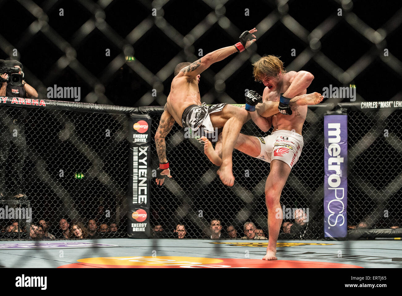 UFC Ultimate Fighting Championship bout in the ring cage octagon at Wembley  Arena in London England Stock Photo - Alamy