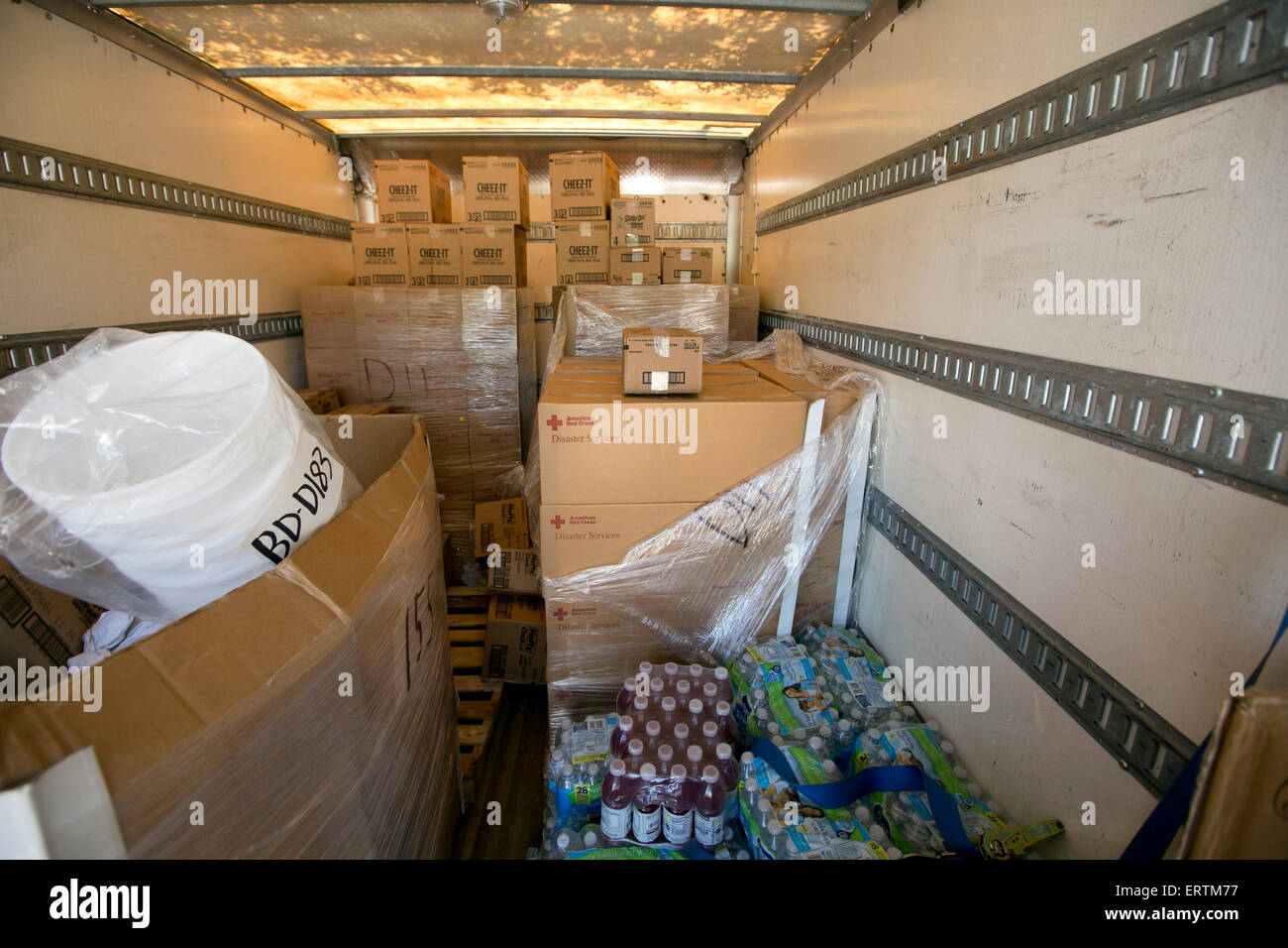 cardboard boxes with disaster supplies donated by the American Red