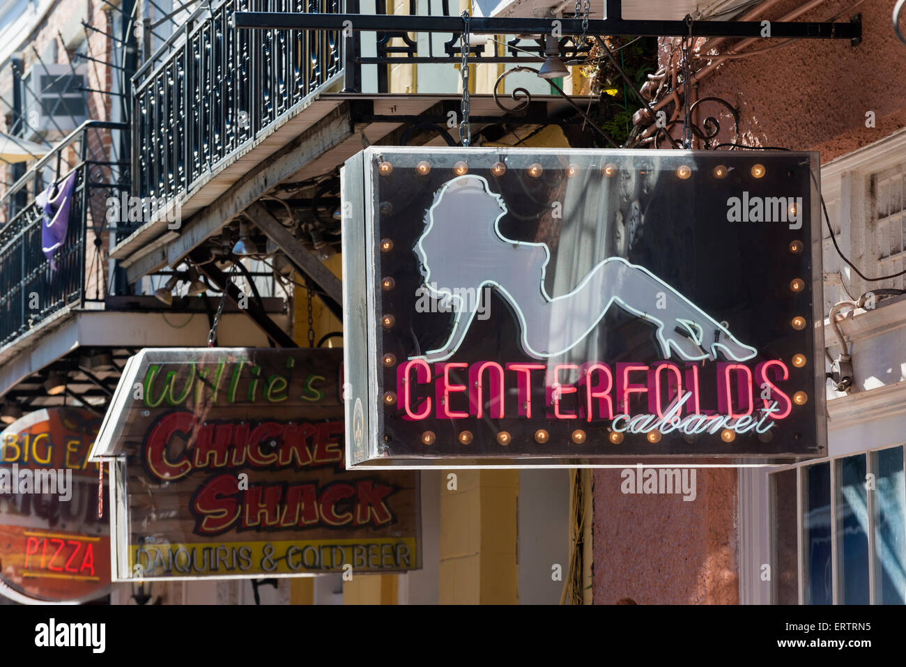 Store and entertainment signs on Bourbon Street, New Orleans, Louisiana, USA Stock Photo