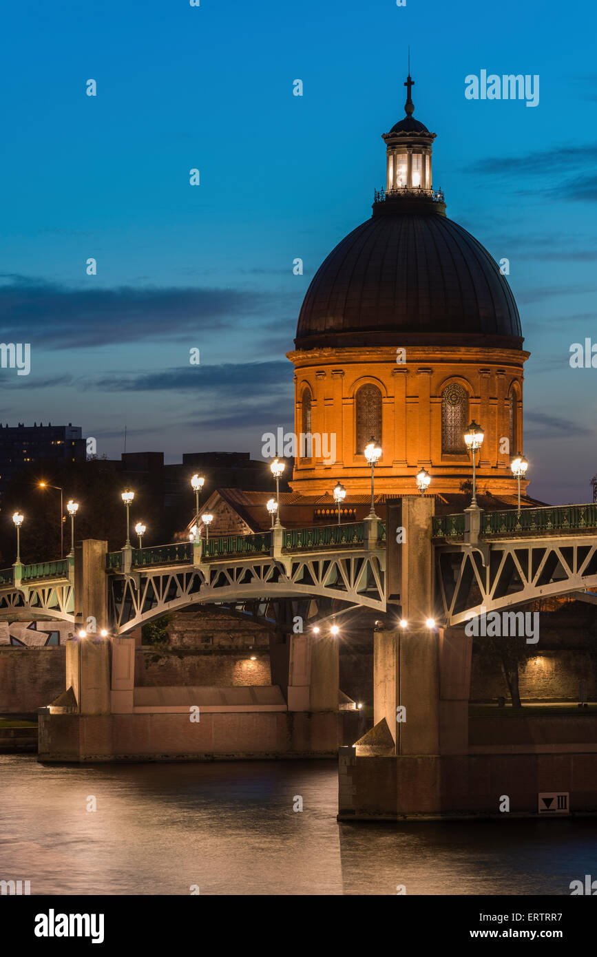 Toulouse, France - The Dome of the Hopital de la Grave overlooking St Pierre bridge at night Stock Photo