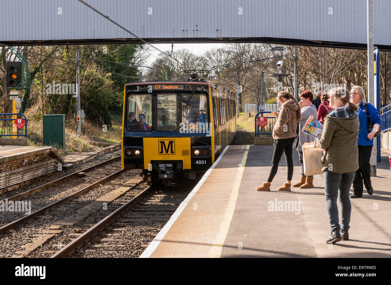 Newcastle Metro train arriving at a station, Newcastle Upon Tyne, North East England, UK Stock Photo