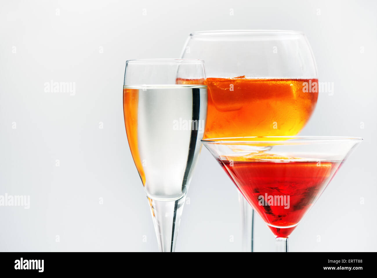 Assorted alcoholic cocktails in different shaped glasses Stock Photo