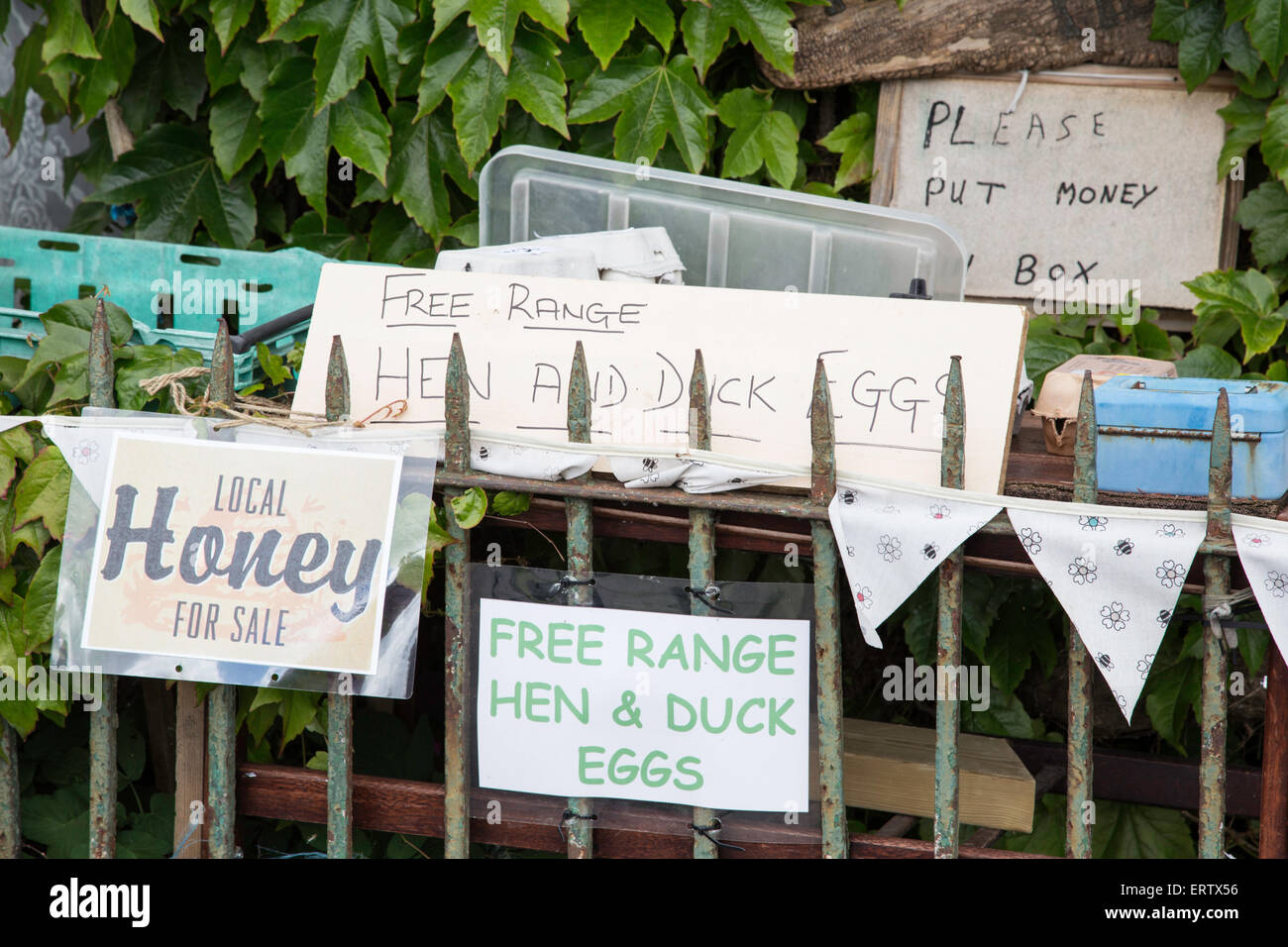 Local produce for sale at a cottage gate, England, UK Stock Photo