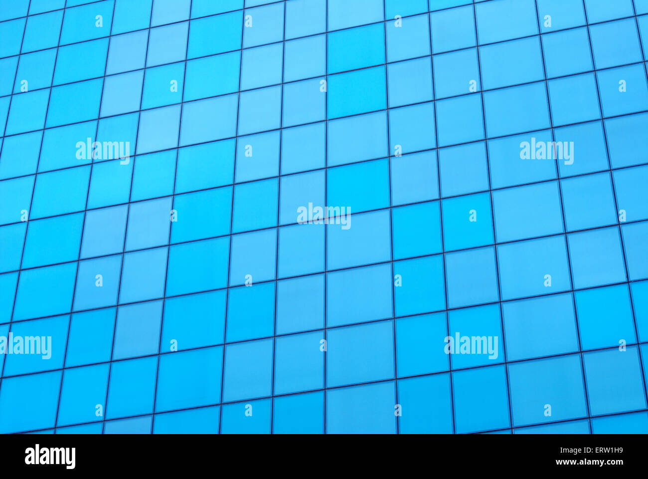 Modern skyscrapers close-up toned in blue color Stock Photo - Alamy