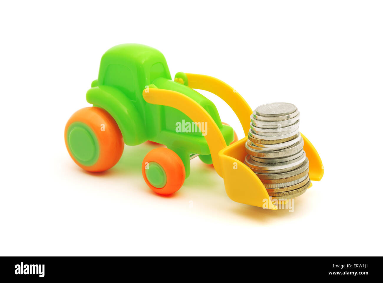 The toy excavator loads money on white background Stock Photo