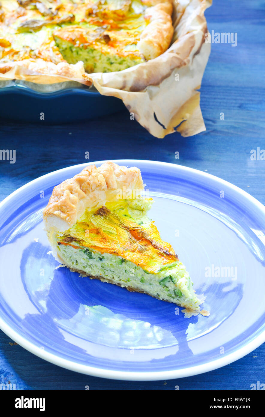 Savory pie with ricotta, parmesan and zucchini flowers Stock Photo Alamy